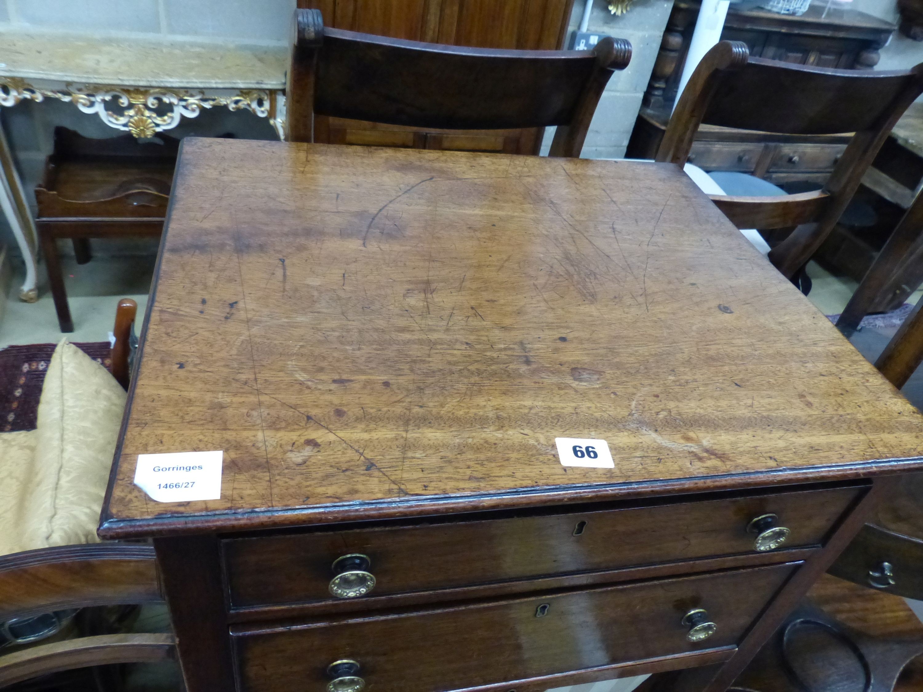 A George III mahogany work table, with two frieze drawers and silks box, on square legs with castors, W.51cm D.43cm H.74cm